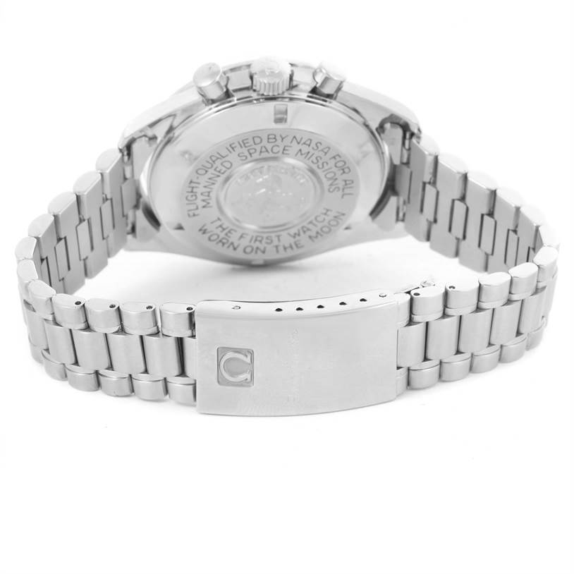 The image shows the back and clasp of an Omega Speedmaster Men
s Stainless Steel Black Dial Men
s Stainless Steel Black Dial watch, highlighting its engraved case back and metal bracelet.