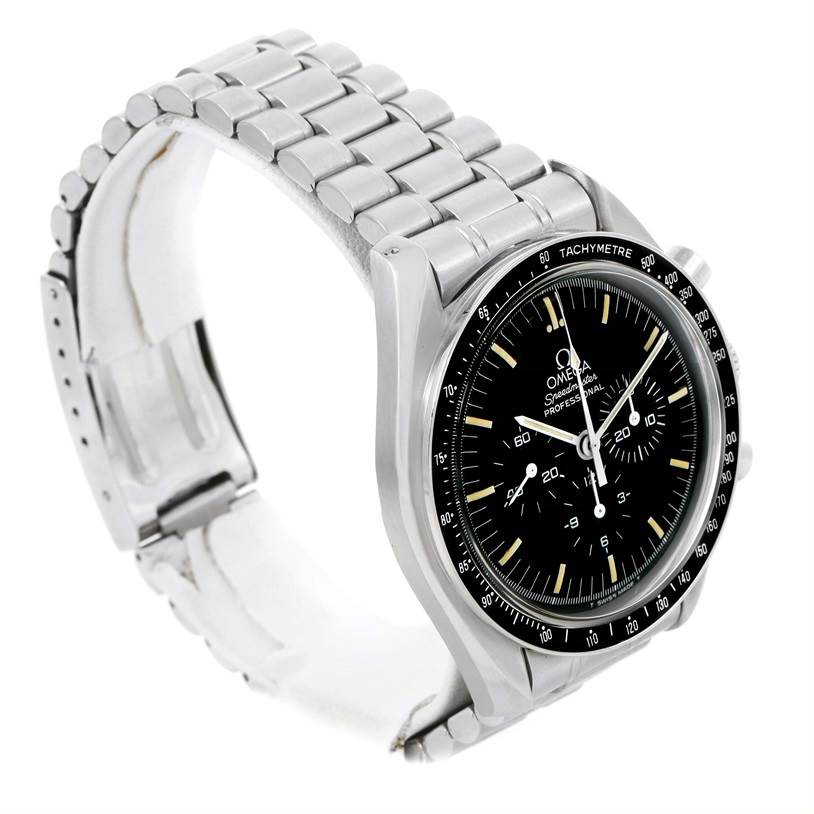 The image shows an Omega Speedmaster Men
s Stainless Steel Black Dial Men
s Stainless Steel Black Dial watch at an angle highlighting the face, bezel, and metal bracelet.