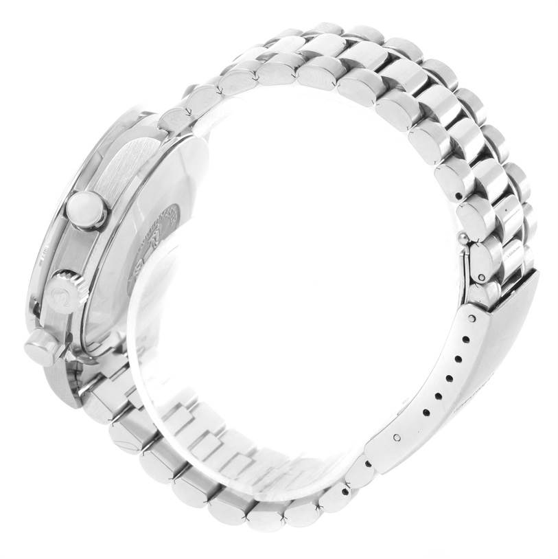 The image shows a side view of an Omega Speedmaster 3510.82.00 Men
s Stainless Steel Blue Dial 3510.82.00 Men
s Stainless Steel Blue Dial watch, highlighting the crown, pushers, and metal bracelet.