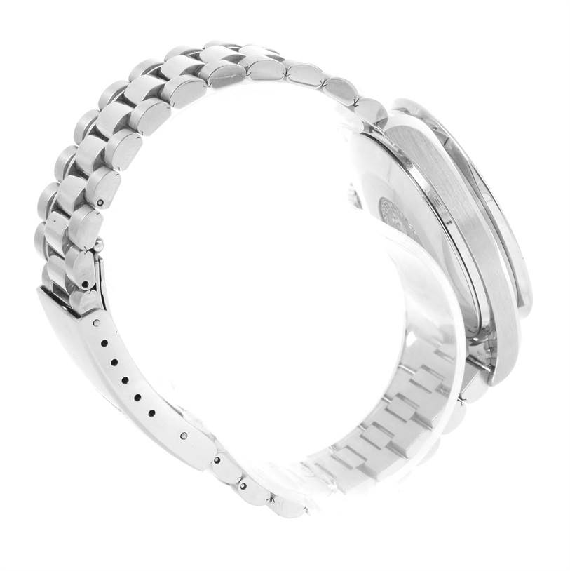 The image shows the side view of an Omega Speedmaster 3510.82.00 Men
s Stainless Steel Blue Dial 3510.82.00 Men
s Stainless Steel Blue Dial watch displaying its metal bracelet and partially visible case back.