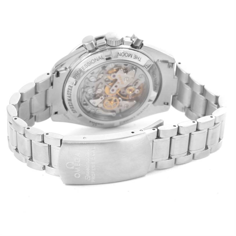 The image shows the back view of an Omega Speedmaster 3572.50.00 Men
s Stainless Steel Black Dial 3572.50.00 Men
s Stainless Steel Black Dial watch, highlighting its clasp, bracelet, and mechanical movement through a transparent case back.