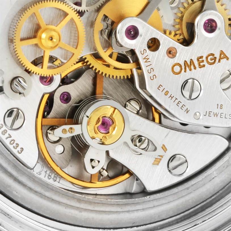 This close-up image shows the intricate movement and components of the Omega Speedmaster 3570.50.00 Men
s Stainless Steel Black Dial 3570.50.00 Men
s Stainless Steel Black Dial watch.