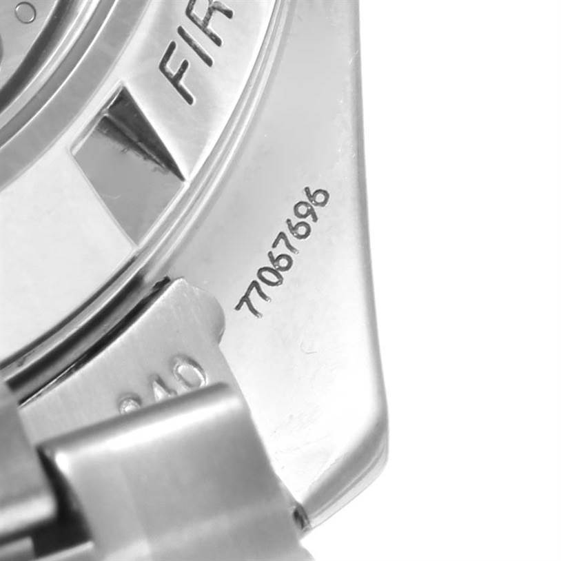 The image shows a partial view of the back casing and bracelet of an Omega Speedmaster 3572.50.00 Men
s Stainless Steel Black Dial 3572.50.00 Men
s Stainless Steel Black Dial watch, featuring the model
s serial number.