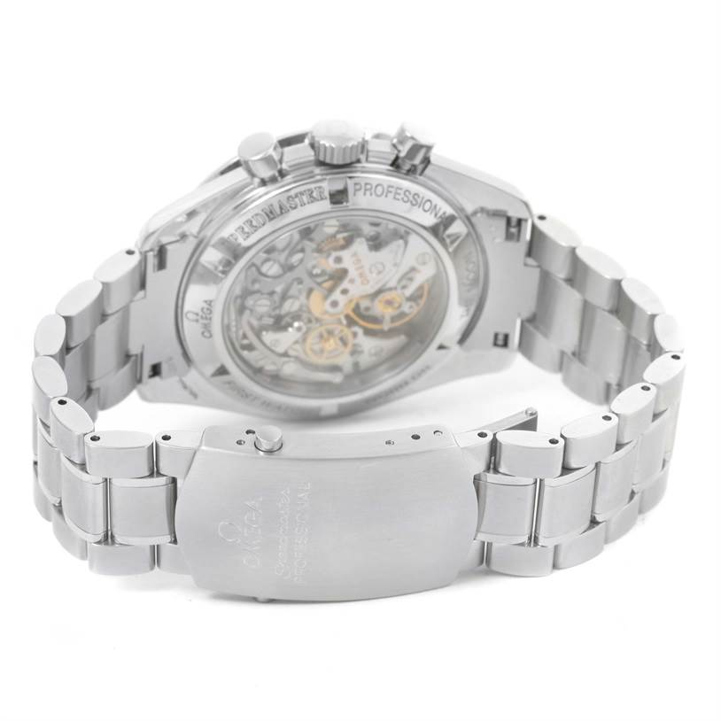 The image shows the Omega Speedmaster 3572.50.00 Men
s Stainless Steel Black Dial 3572.50.00 Men
s Stainless Steel Black Dial watch from the back, highlighting its stainless steel case back and bracelet.