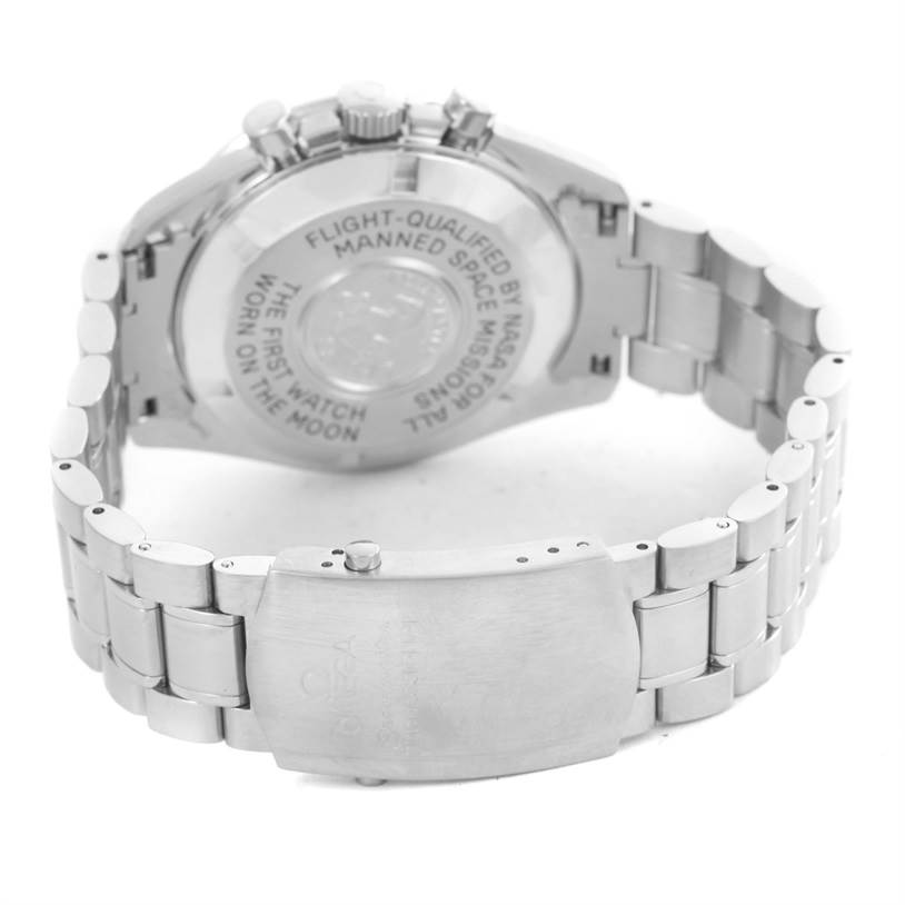 The image shows the back view of the Omega Speedmaster 3570.50.00 Men
s Stainless Steel Black Dial 3570.50.00 Men
s Stainless Steel Black Dial watch, focusing on its case back and bracelet clasp.