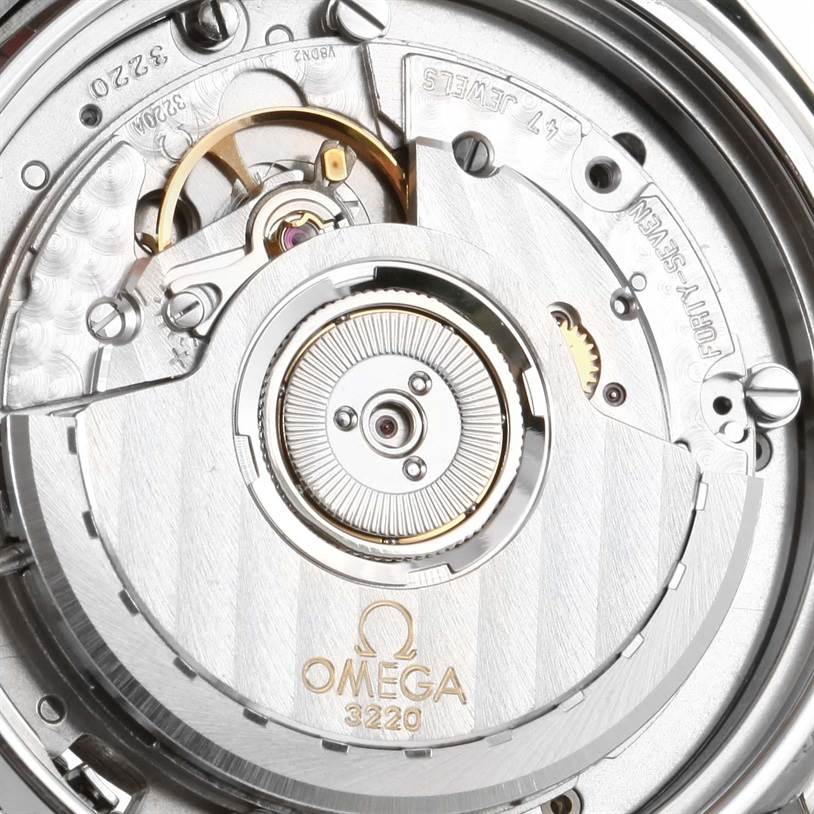 The image shows the intricate movement and inner mechanism of an Omega Speedmaster 3539.50.00 Men
s Stainless Steel Black Dial 3539.50.00 Men
s Stainless Steel Black Dial watch from a close-up angle.