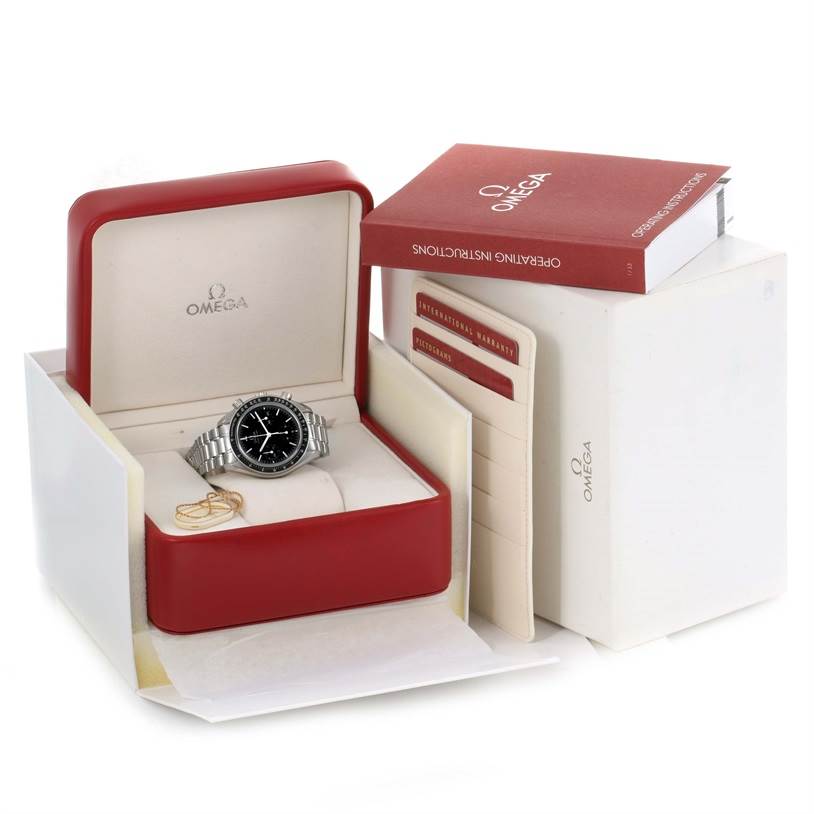 The Omega Speedmaster 3539.50.00 Men
s Stainless Steel Black Dial 3539.50.00 Men
s Stainless Steel Black Dial watch is displayed in an open red box at an angle, with an instruction manual and warranty cards beside it.