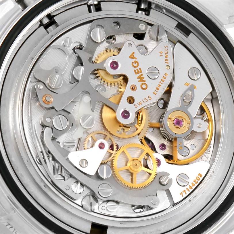 This is a close-up view of the internal mechanics of an Omega Speedmaster 3570.50.00 Men
s Stainless Steel Black Dial 3570.50.00 Men
s Stainless Steel Black Dial watch, showing gears and movement components.