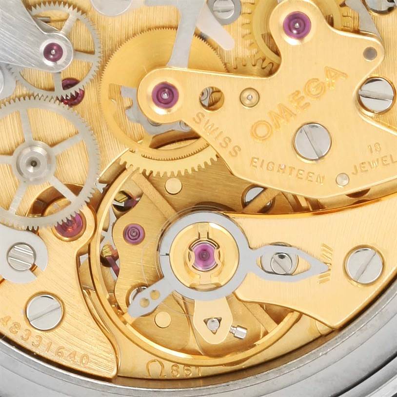 This close-up image shows the intricate inner mechanics and gears of the Omega Speedmaster 3590.50.00 Men
s Stainless Steel Black Dial 3590.50.00 Men
s Stainless Steel Black Dial watch movement.
