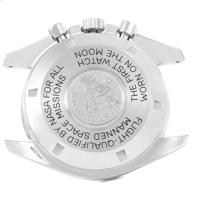 The image shows the case back of an Omega Speedmaster 3590.50.00 Men
s Stainless Steel Black Dial 3590.50.00 Men
s Stainless Steel Black Dial watch, highlighting its engravings and the crown with pushers.