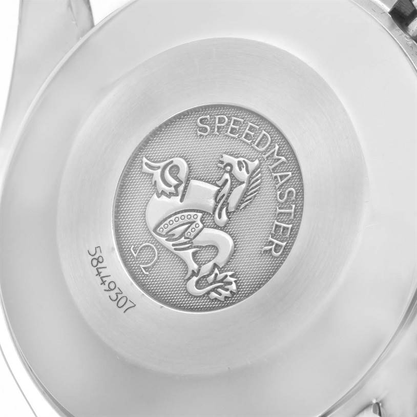 This image shows the back case of an Omega Speedmaster 3510.82.00 Men
s Stainless Steel Blue Dial 3510.82.00 Men
s Stainless Steel Blue Dial watch, featuring its logo and some serial numbers.