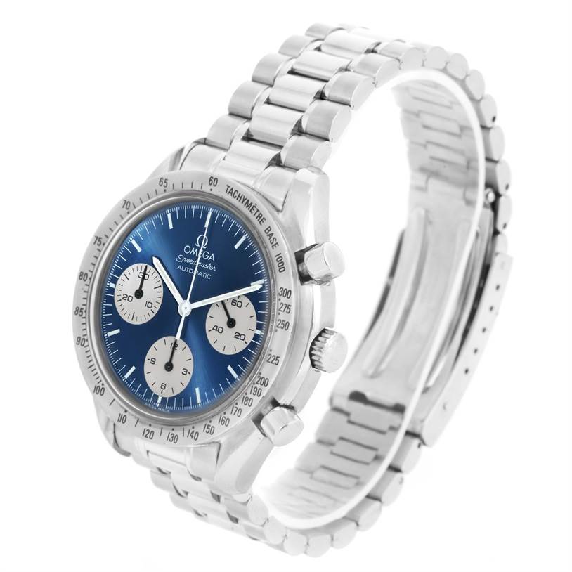 The Omega Speedmaster 3510.82.00 Men
s Stainless Steel Blue Dial 3510.82.00 Men
s Stainless Steel Blue Dial watch is shown from an oblique angle, highlighting its silver band and blue dial with three subdials.