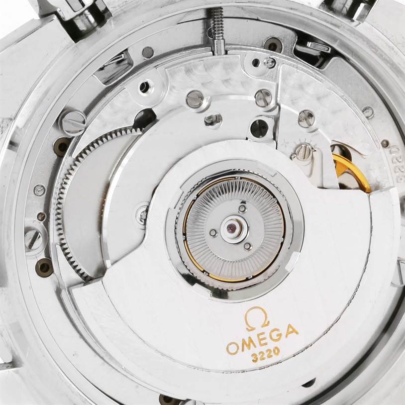 The image shows the movement mechanism of an Omega Speedmaster 3510.82.00 Men
s Stainless Steel Blue Dial 3510.82.00 Men
s Stainless Steel Blue Dial watch from the back, displaying its intricate internal components.