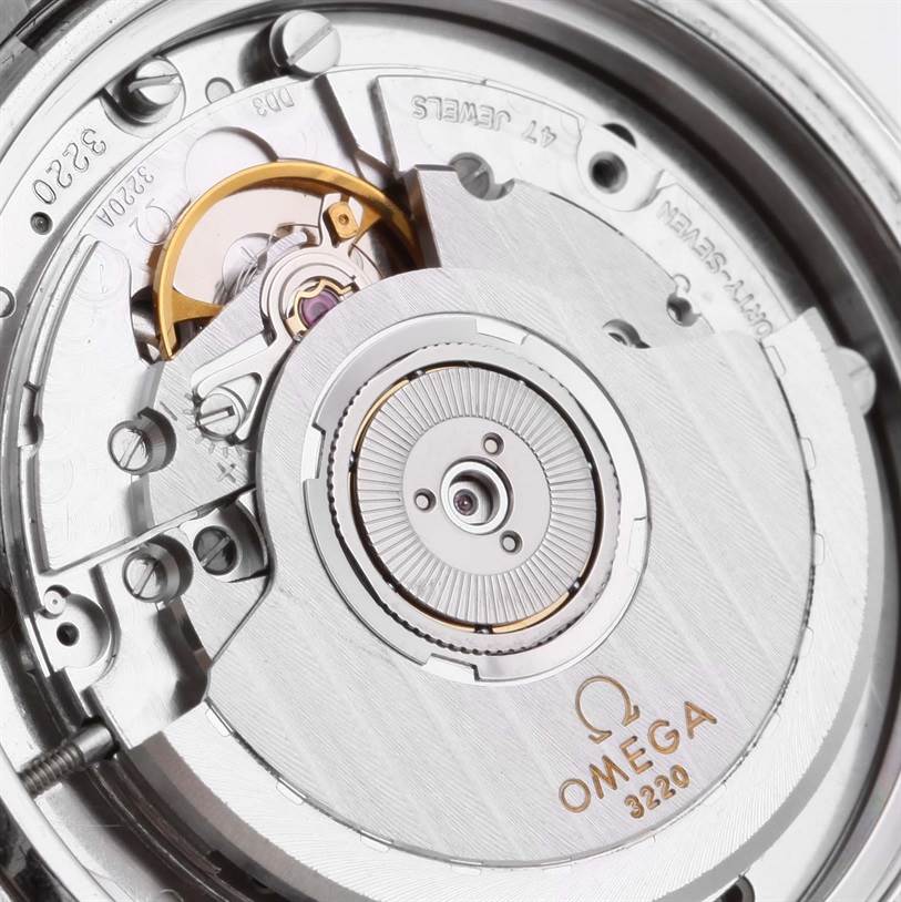 The image shows the movement mechanism and internal components of an Omega Speedmaster 3510.82.00 Men
s Stainless Steel Blue Dial 3510.82.00 Men
s Stainless Steel Blue Dial watch.