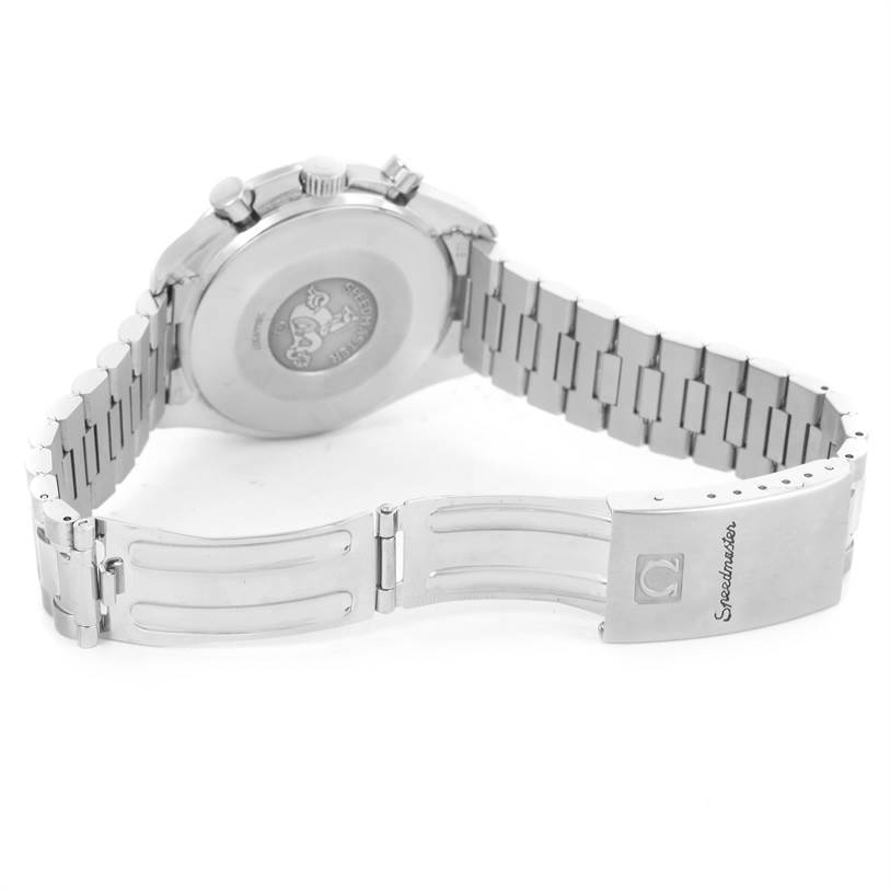 The image shows the back case and metal bracelet clasp of an Omega Speedmaster 3510.82.00 Men
s Stainless Steel Blue Dial 3510.82.00 Men
s Stainless Steel Blue Dial watch.