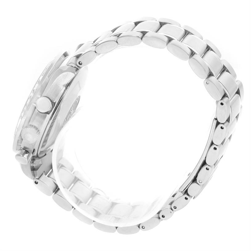 The image shows the side view of an Omega Speedmaster 3513.82.00 Men
s Stainless Steel Blue Dial 3513.82.00 Men
s Stainless Steel Blue Dial watch, featuring its stainless steel bracelet and case.