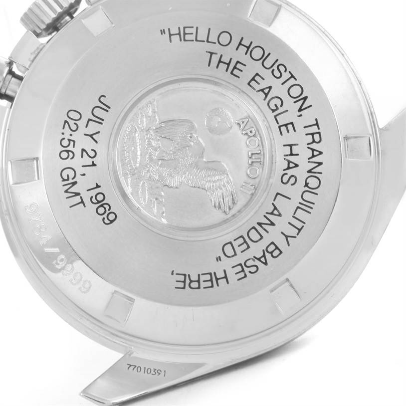 This is a close-up of the back of an Omega Speedmaster 3560.50.00 Men
s Stainless Steel Black Dial 3560.50.00 Men
s Stainless Steel Black Dial watch, showing the Apollo 11 mission inscription.