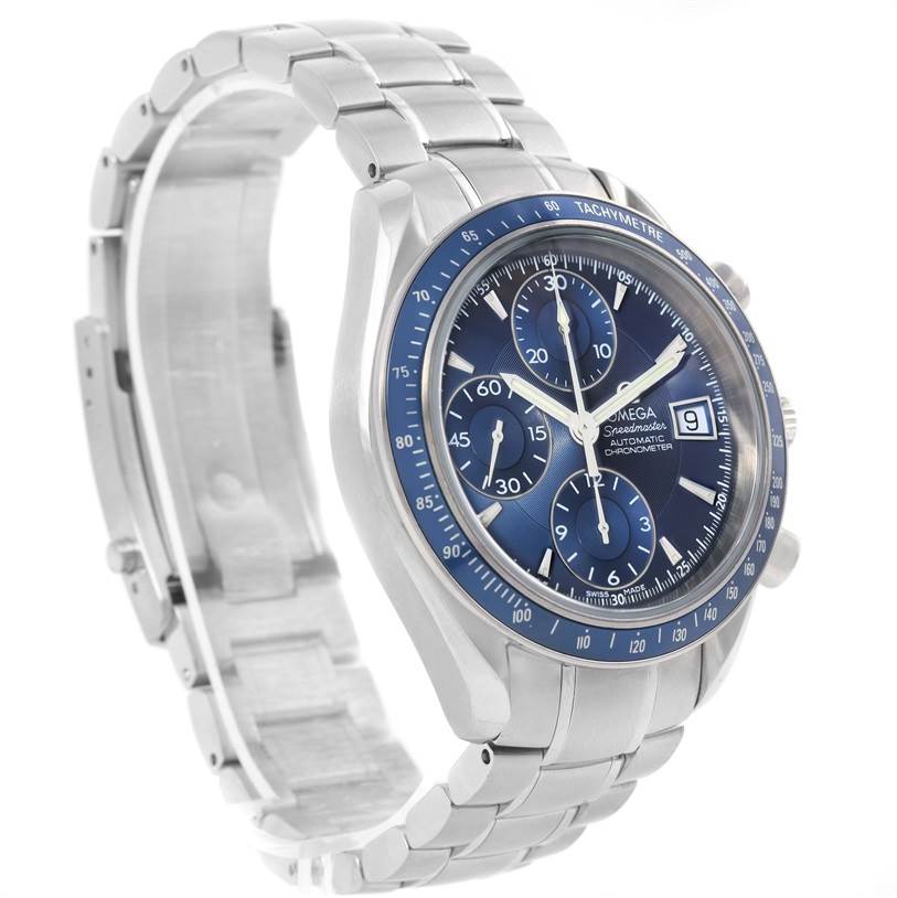 This Omega Speedmaster 3212.80.00 Men
s Stainless Steel Blue Dial 3212.80.00 Men
s Stainless Steel Blue Dial watch is shown from a three-quarter angle, highlighting its blue dial, subdials, tachymeter bezel, and metal bracelet.