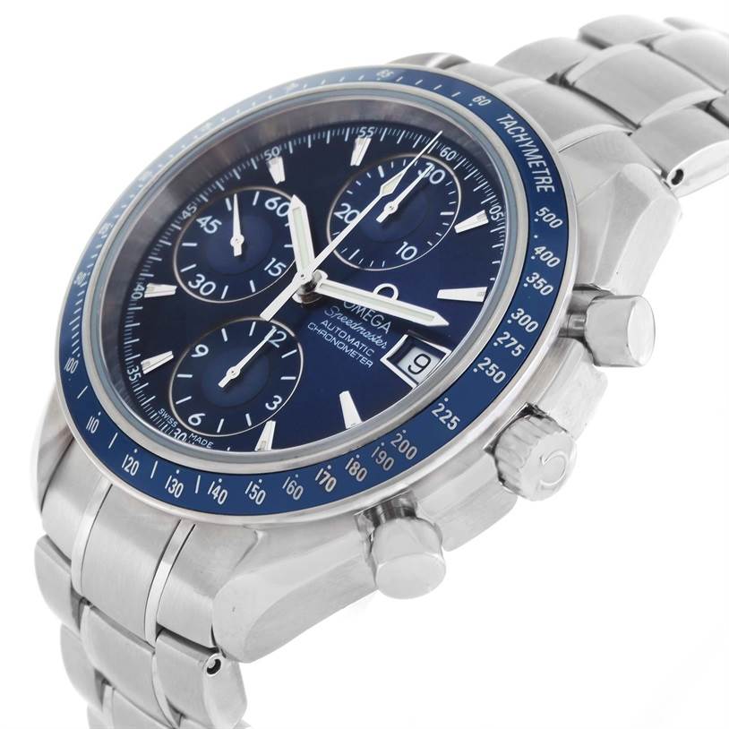 The image shows an angled view of an Omega Speedmaster 3212.80.00 Men
s Stainless Steel Blue Dial 3212.80.00 Men
s Stainless Steel Blue Dial watch, highlighting its dial, bezel, pushers, crown, and bracelet.