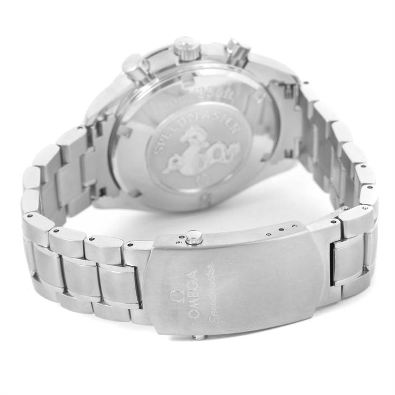 The image shows the back and clasp of an Omega Speedmaster 3212.80.00 Men
s Stainless Steel Blue Dial 3212.80.00 Men
s Stainless Steel Blue Dial watch, highlighting its stainless steel bracelet and engraved case back.
