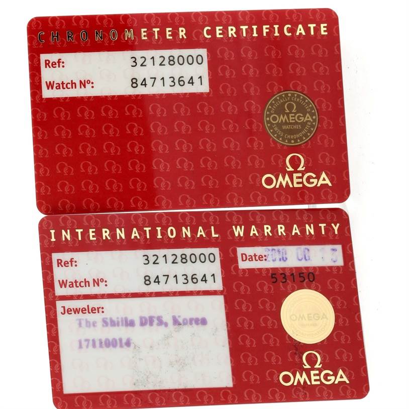 The image shows Chronometer Certificate and International Warranty cards for the Omega Speedmaster 3212.80.00 Men
s Stainless Steel Blue Dial 3212.80.00 Men
s Stainless Steel Blue Dial model.