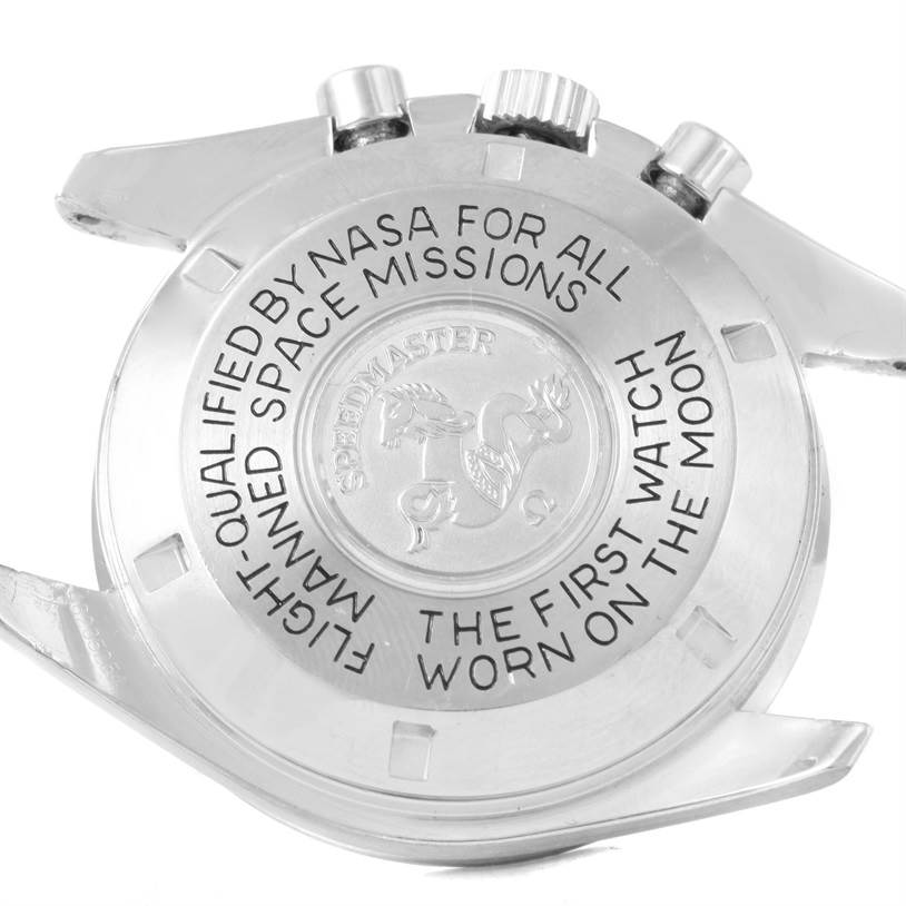 The image shows the back of an Omega Speedmaster 3590.50.00 Men
s Stainless Steel Black Dial 3590.50.00 Men
s Stainless Steel Black Dial watch, displaying the engraved text and emblem.