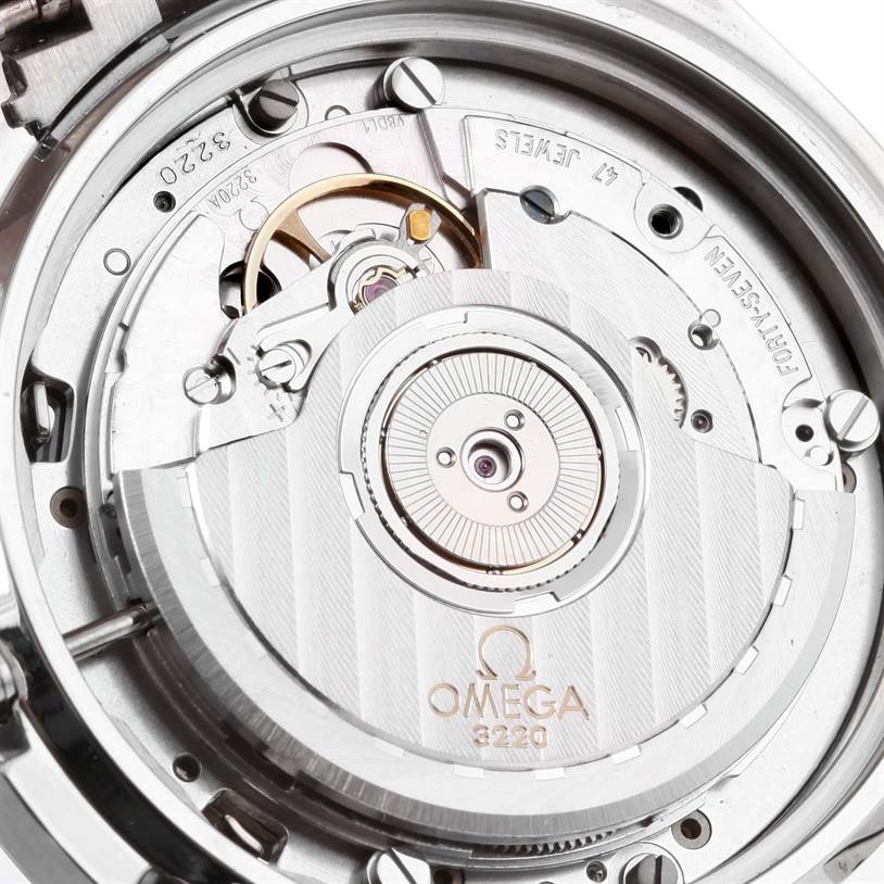 The image shows a close-up view of the Omega Speedmaster 3539.50.00 Men's Stainless Steel Black Dial 3539.50.00 Men's Stainless Steel Black Dial watch movement, highlighting the rotor and internal mechanics.