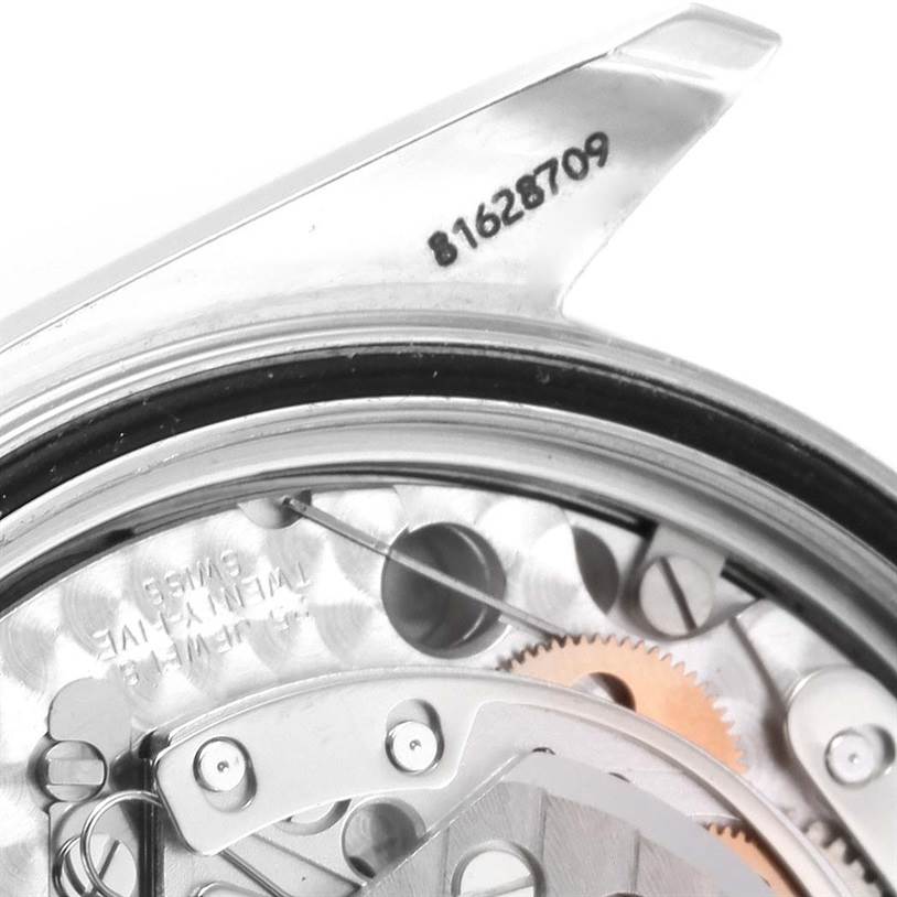 This image shows a close-up of the movement and internal mechanism of an Omega Speedmaster 3222.80.00 Men
s Stainless Steel Blue Dial 3222.80.00 Men
s Stainless Steel Blue Dial watch.