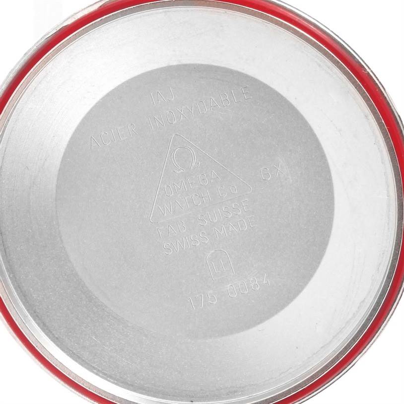 The image shows the inside of the case back for an Omega Speedmaster 3520.50.00 Men
s Stainless Steel Black Dial 3520.50.00 Men
s Stainless Steel Black Dial watch, displaying inscriptions and stampings.