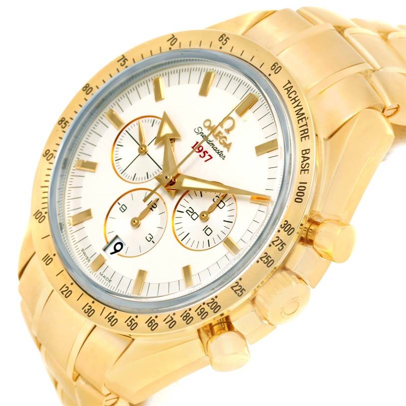 This image shows a close-up view of an Omega Speedmaster 321.50.42.50.02.001 Men's Yellow Gold Silver Dial 321.50.42.50.02.001 Men's Yellow Gold Silver Dial watch focusing on the dial, chronograph subdials, bezel, and bracelet.