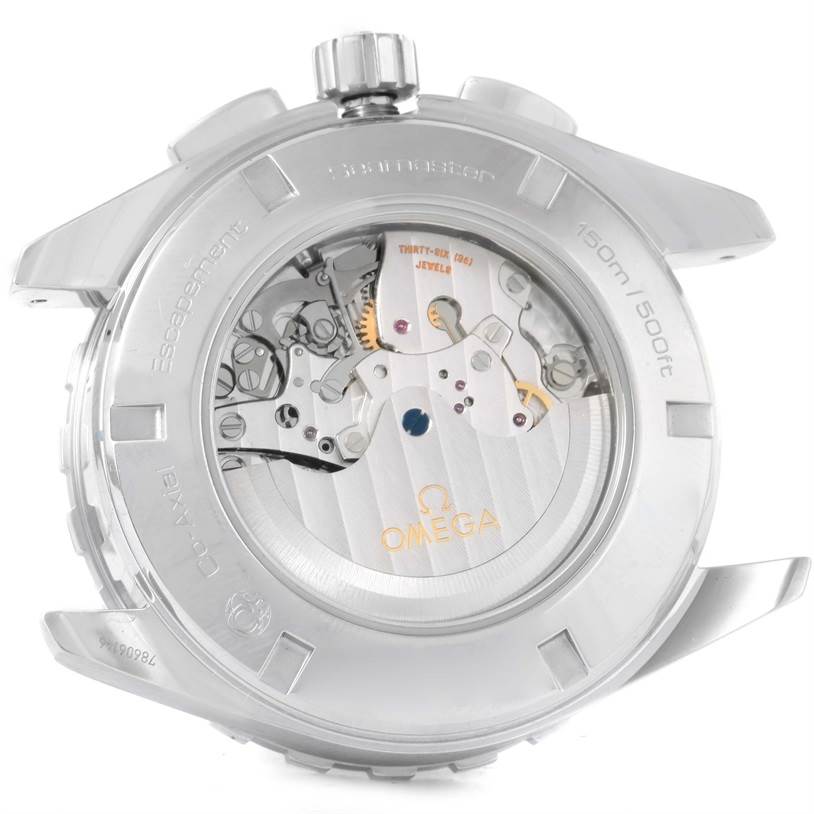 The image shows the back case of the Omega Speedmaster 231.10.44.52.04.001 Men
s Stainless Steel White Dial 231.10.44.52.04.001 Men
s Stainless Steel White Dial watch, highlighting its mechanical movement and inner components.