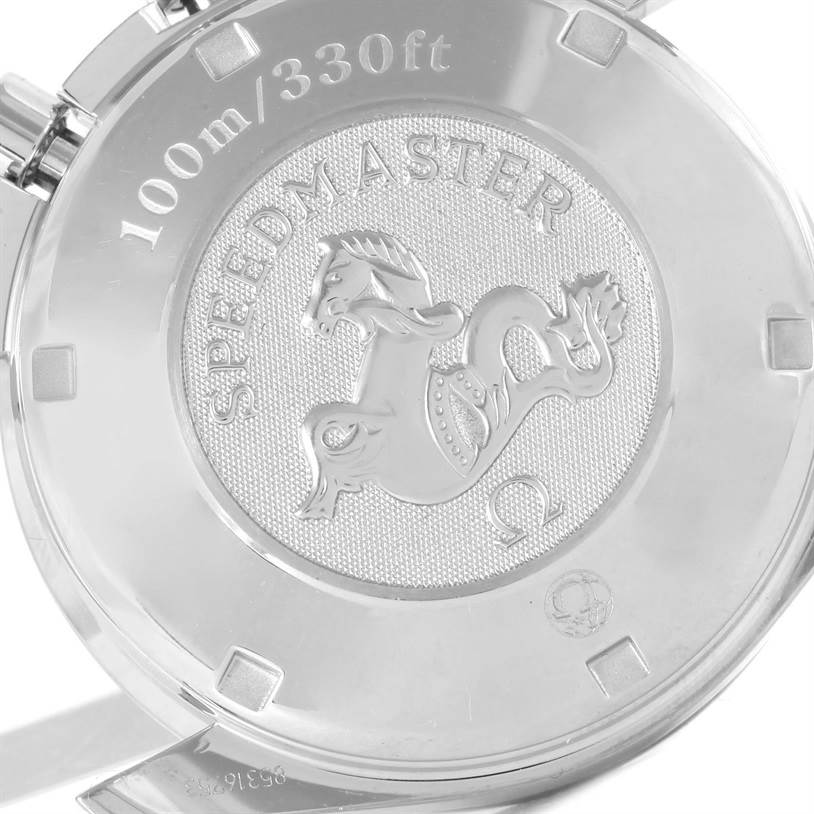 The image shows the engraved case back of an Omega Speedmaster 3211.31.00 Men
s Stainless Steel Silver Dial 3211.31.00 Men
s Stainless Steel Silver Dial watch, depicting a seahorse motif and water resistance details.