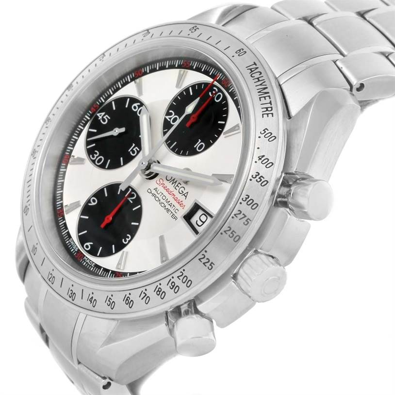 The image shows an angled view of an Omega Speedmaster 3211.31.00 Men
s Stainless Steel Silver Dial 3211.31.00 Men
s Stainless Steel Silver Dial watch highlighting the dial, bezel, pushers, and part of the bracelet.