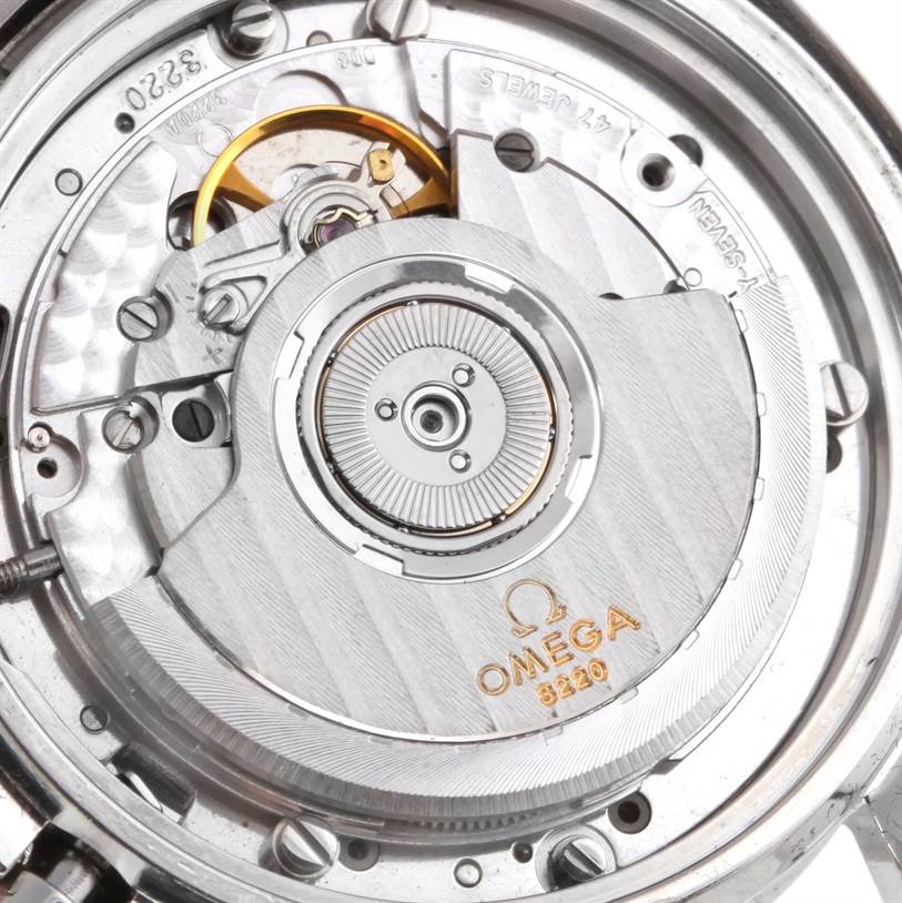 This image shows the exposed movement and inner mechanisms of an Omega Speedmaster 3510.82.00 Men
s Stainless Steel Blue Dial 3510.82.00 Men
s Stainless Steel Blue Dial watch.