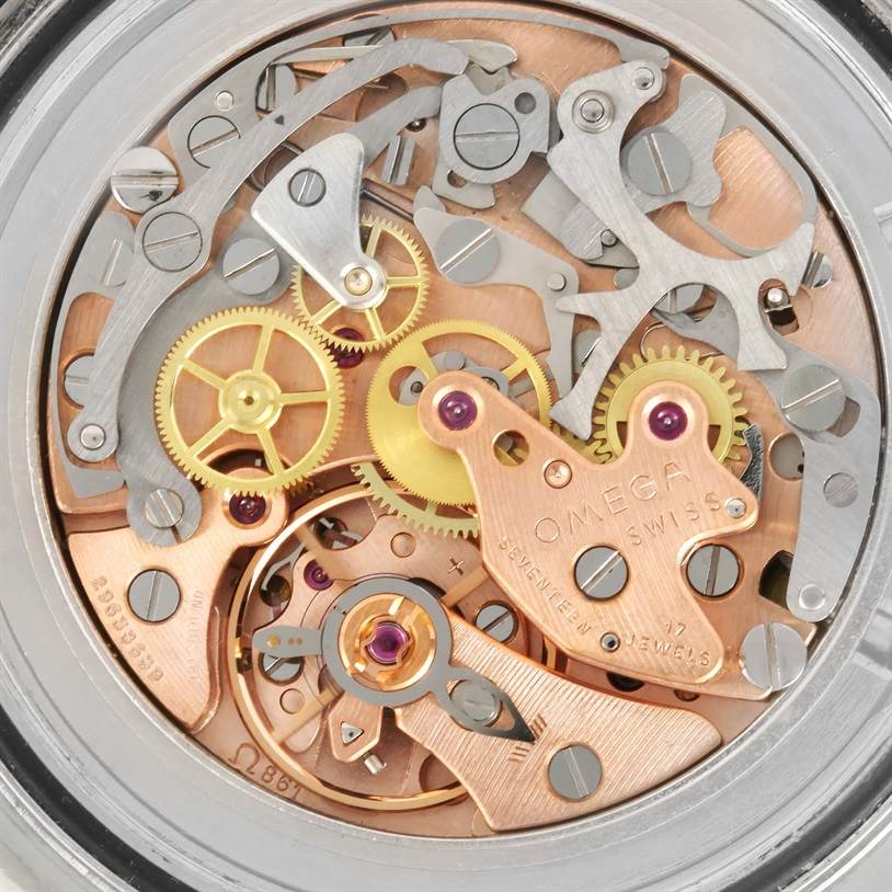 This image shows a close-up view of the intricate movement and inner mechanisms of an Omega Speedmaster 145.022 Men
s Stainless Steel Black Dial 145.022 Men
s Stainless Steel Black Dial watch.