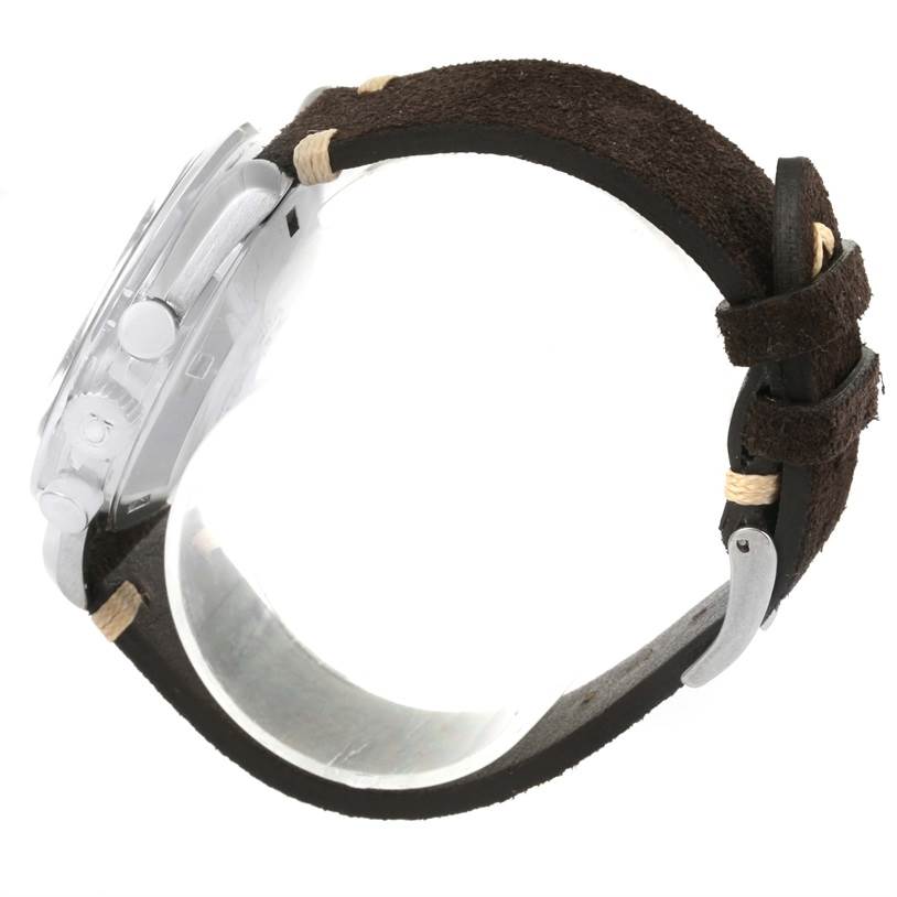 This image shows a side profile of an Omega Speedmaster 145.022 Men
s Stainless Steel Black Dial 145.022 Men
s Stainless Steel Black Dial watch, highlighting its dial, crown, and leather strap.