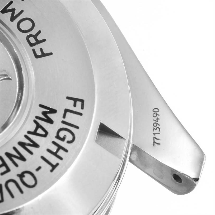 The image shows a close-up of the case back and one of the lugs of an Omega Speedmaster 3577.50.00 Men
s Stainless Steel Black Dial 3577.50.00 Men
s Stainless Steel Black Dial watch.