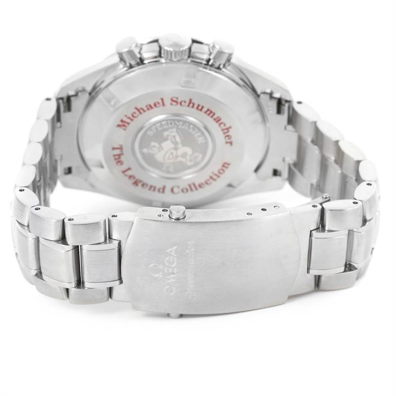 This image shows the back case and bracelet clasp of an Omega Speedmaster 3506.61.00 Men's Stainless Steel Red Dial 3506.61.00 Men's Stainless Steel Red Dial watch, with visible engravings.