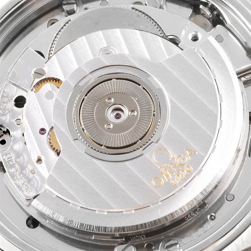 Close-up of the Omega Speedmaster 3539.50.00 Men
s Stainless Steel Black Dial 3539.50.00 Men
s Stainless Steel Black Dial’s movement, highlighting its intricate mechanical components and the Omega logo.