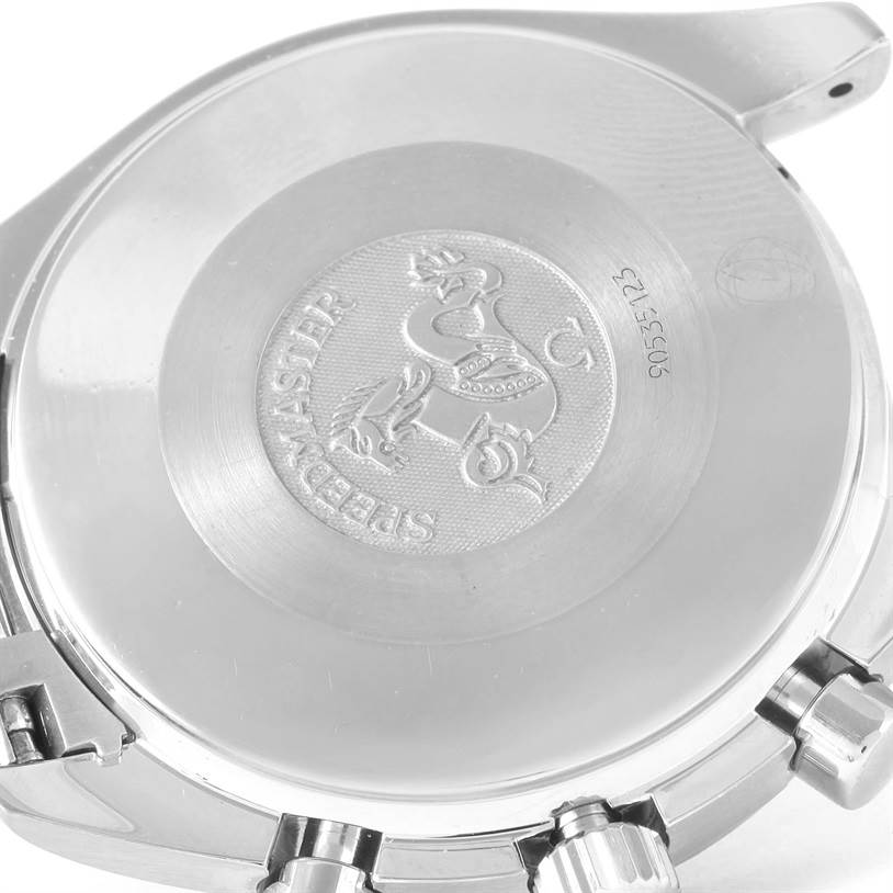 The image shows the back case of an Omega Speedmaster 3539.50.00 Men
s Stainless Steel Black Dial 3539.50.00 Men
s Stainless Steel Black Dial watch, highlighting the engraved emblem and partial bracelet links.