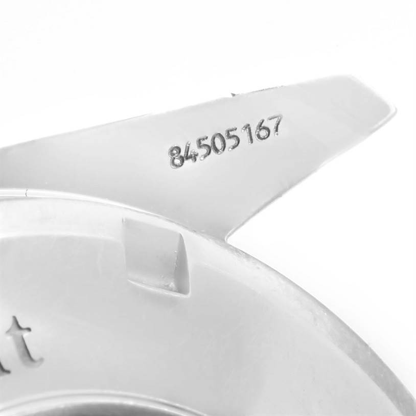 This image shows a close-up angle of an engraved part of an Omega Speedmaster 3210.52.00 Men
s Stainless Steel Black Dial 3210.52.00 Men
s Stainless Steel Black Dial watch, highlighting the serial number.