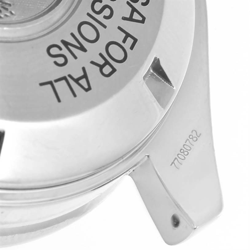 The image shows the case back and part of the lugs of an Omega Speedmaster 3570.50.00 Men
s Stainless Steel Black Dial 3570.50.00 Men
s Stainless Steel Black Dial watch.