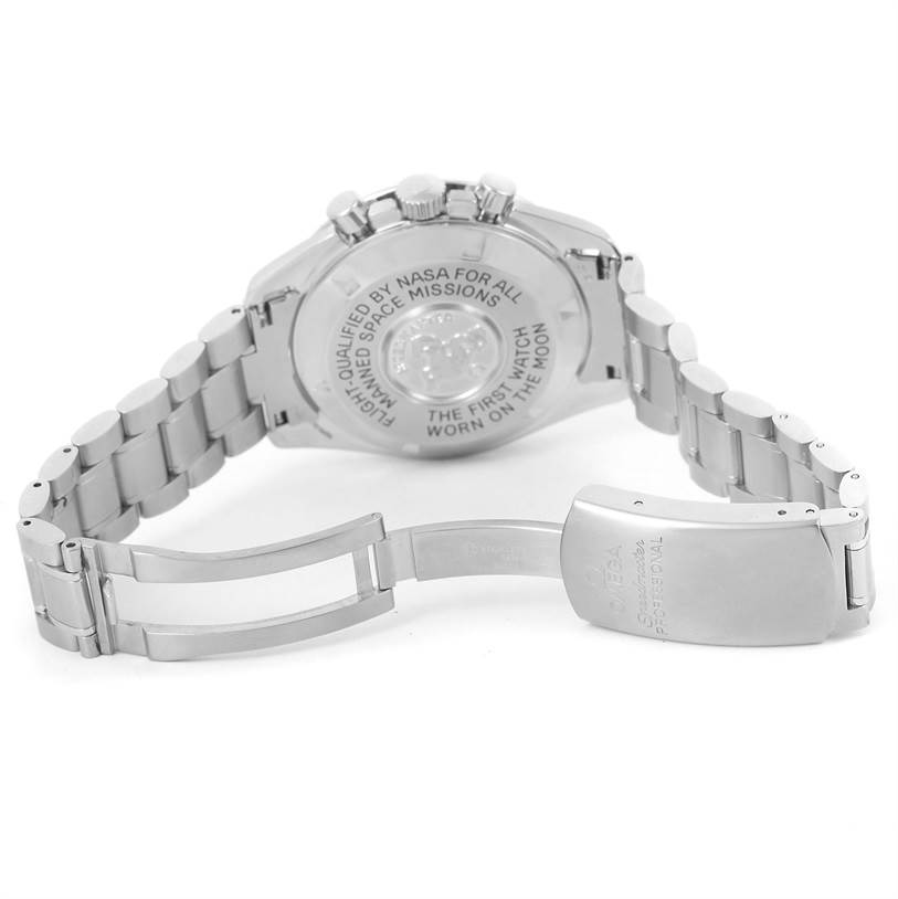 The image shows the back and open clasp of an Omega Speedmaster 3570.50.00 Men
s Stainless Steel Black Dial 3570.50.00 Men
s Stainless Steel Black Dial watch, highlighting the engraved back and the metal bracelet.