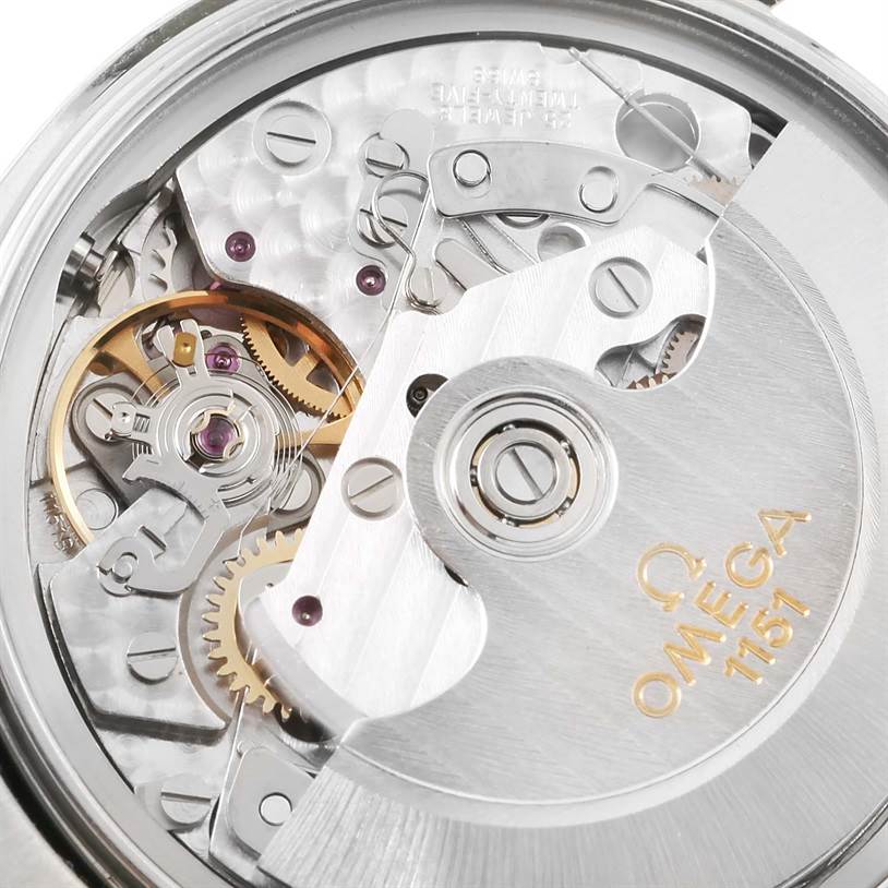 This image shows the exposed movement and inner mechanics of an Omega Speedmaster 3523.80.00 Men
s Stainless Steel Blue Dial 3523.80.00 Men
s Stainless Steel Blue Dial watch, focusing on the Omega 1151 Caliber.