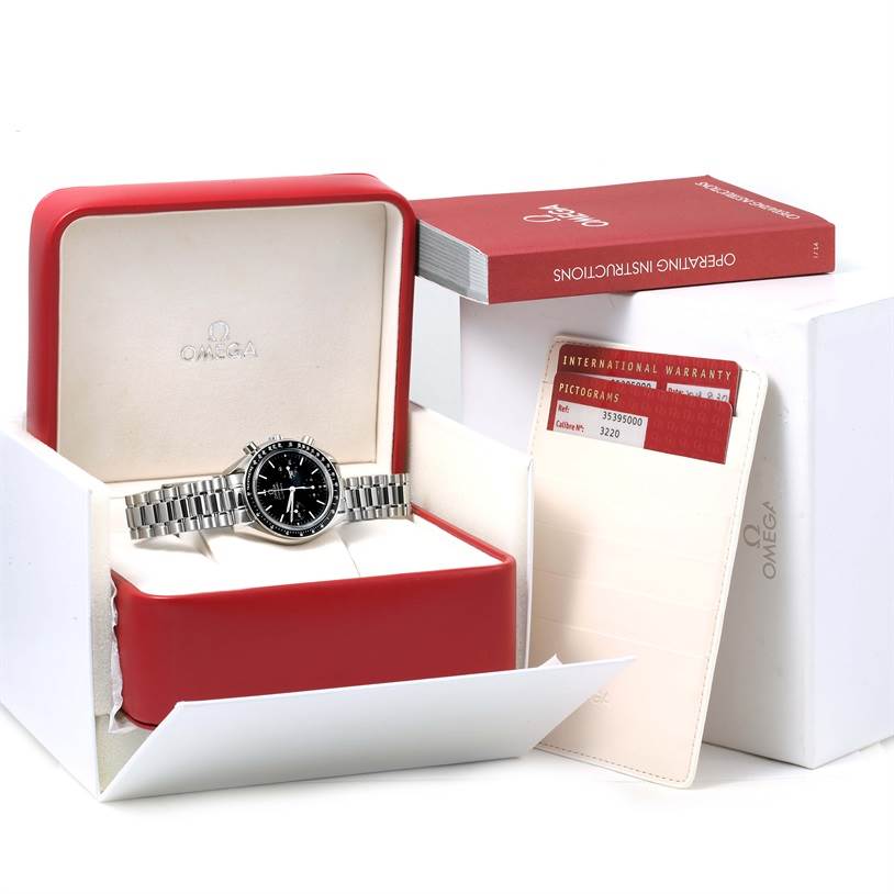 The Omega Speedmaster 3539.50.00 Men
s Stainless Steel Black Dial 3539.50.00 Men
s Stainless Steel Black Dial watch is shown in its open box along with warranty cards and an instruction booklet.