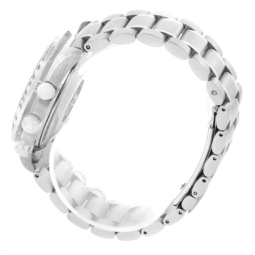 The image shows a side view of an Omega Speedmaster 3523.80.00 Men
s Stainless Steel Blue Dial 3523.80.00 Men
s Stainless Steel Blue Dial watch highlighting its case, crown, pushers, and metal bracelet.