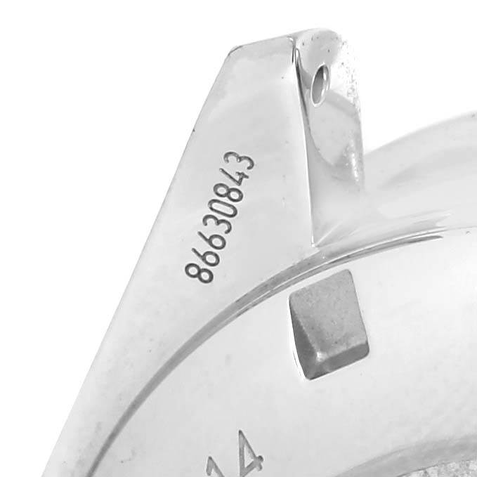 This image shows the backside and part of the case of an Omega Speedmaster 326.30.40.50.06.001 Men
s Stainless Steel Grey Dial 326.30.40.50.06.001 Men
s Stainless Steel Grey Dial watch, featuring the serial number.