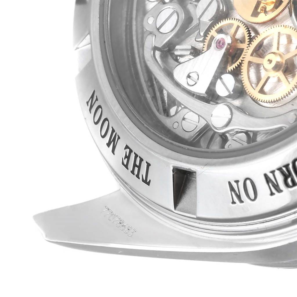 This image shows a close-up of the transparent case back of an Omega Speedmaster 3573.50.00 Men
s Stainless Steel Black Dial 3573.50.00 Men
s Stainless Steel Black Dial watch, revealing its internal gears and mechanisms.