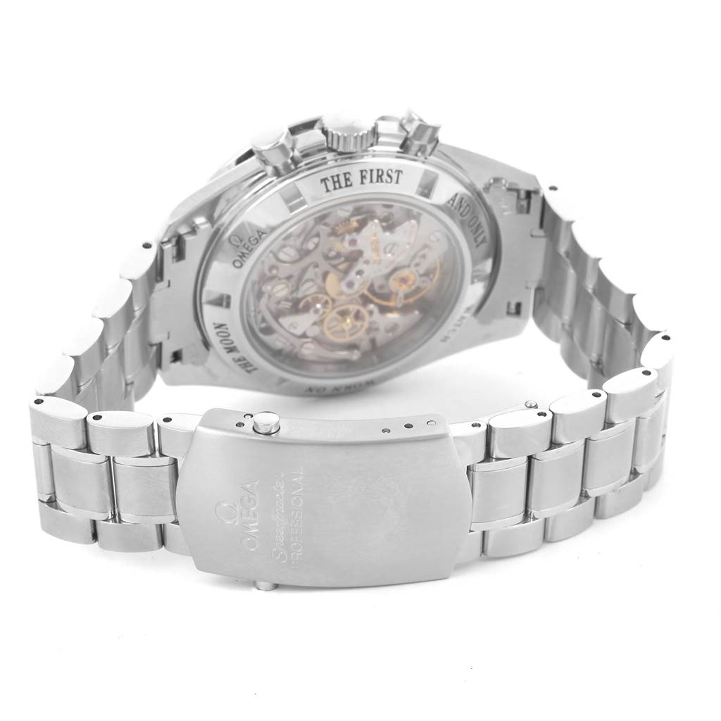 The image shows the rear and side view of an Omega Speedmaster 3573.50.00 Men
s Stainless Steel Black Dial 3573.50.00 Men
s Stainless Steel Black Dial watch, highlighting the transparent case back and stainless steel bracelet.