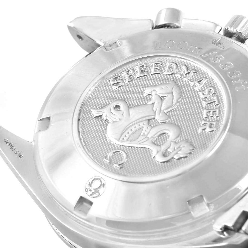 The image shows the engraved case back of an Omega Speedmaster 3211.31.00 Men
s Stainless Steel Silver Dial 3211.31.00 Men
s Stainless Steel Silver Dial watch, highlighting the logo and water resistance details.